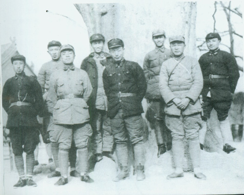 A photo taken in February 1936, featuring leading cadres of the 1st and 15th Corps of the Red Army in Chunhua, Shaanxi. Front row from left: Wang Shoudao, Yang Shangkun, Nie Rongzhen, Xu Haidong. Back row from left: Luo Ruiqing, Cheng Zihua, Chen Guang, Deng Xiaoping.